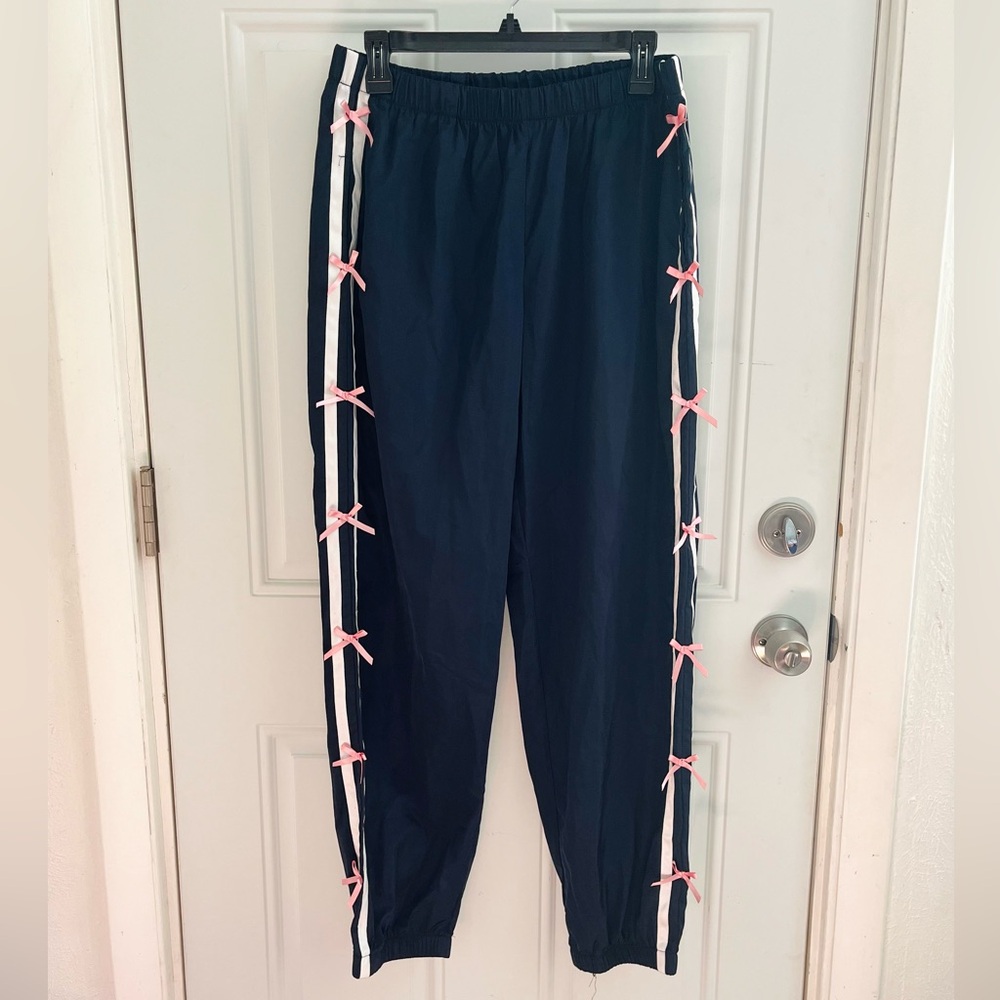 NWOT honey peach trendy striped track pants with cutie pink bows size large
